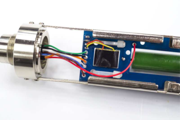 XLR wires being connected to the PCB pads inside the D-12 body.